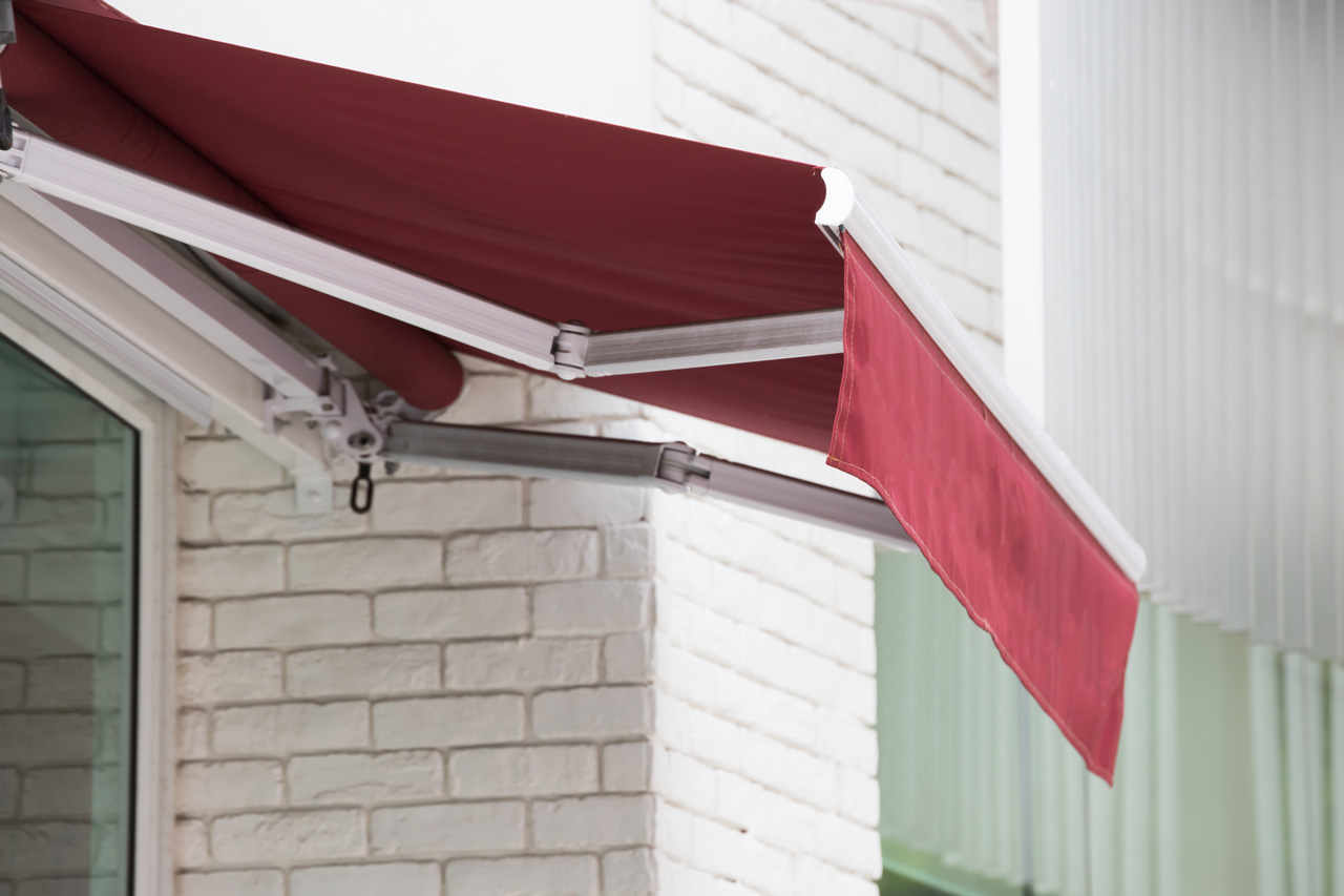A red retractable awning