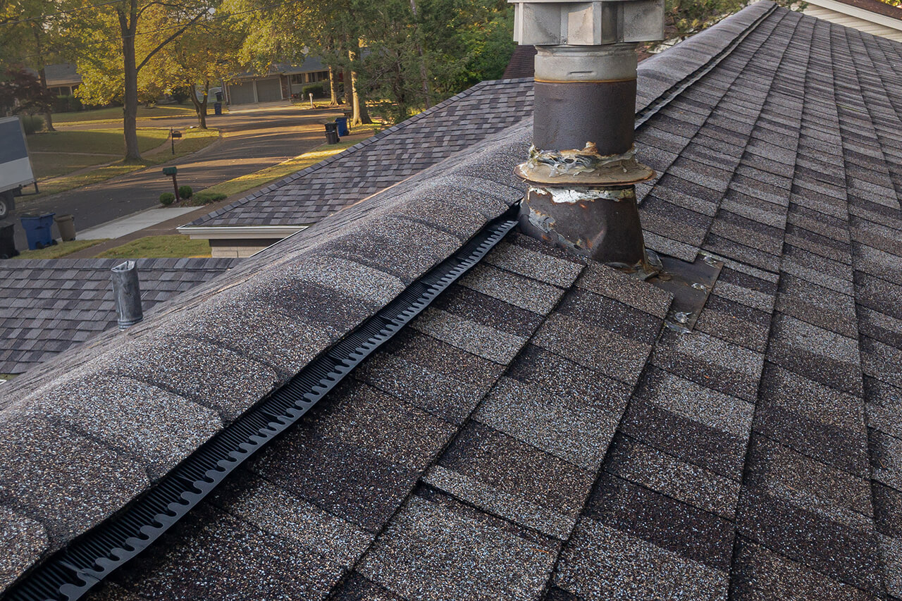 ridge vent installed on top of home roof