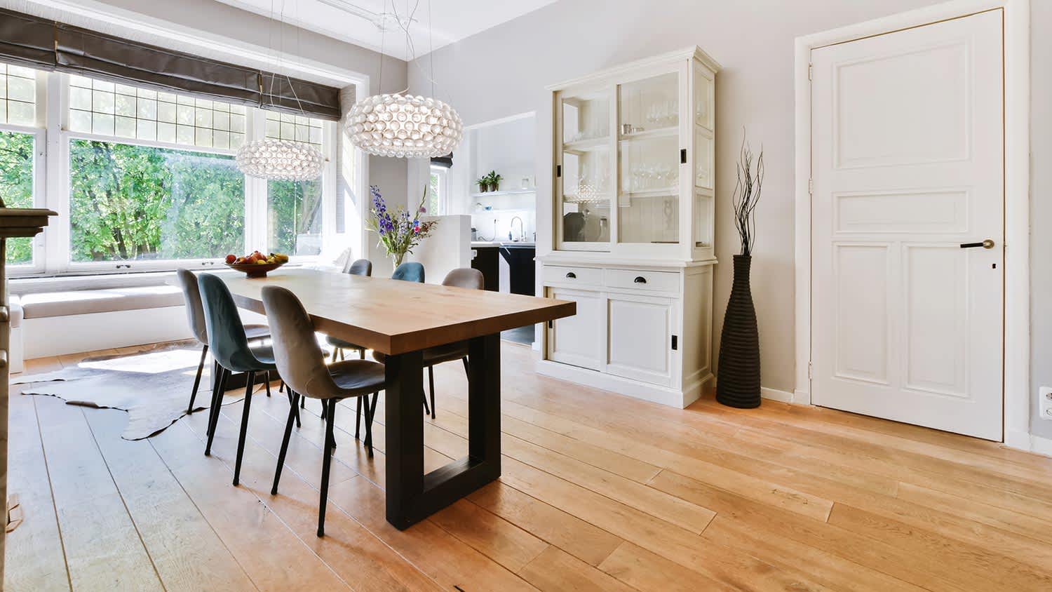 Wide plank hardwoods in dining room