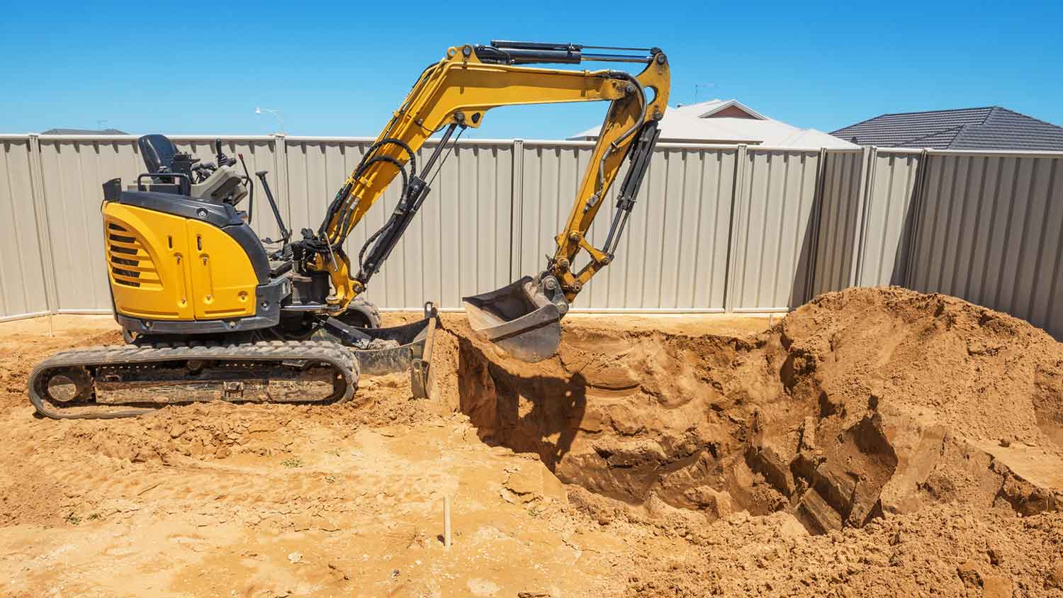 swimming pool excavation in the backyard